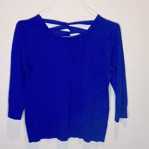 Women Blue sweater. Circular collar front and V shape back. By Cable & Gauge.